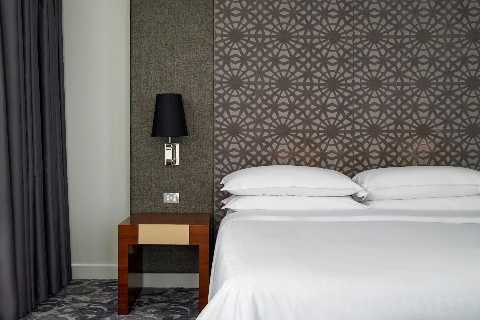 Larger Treasury One-Bedroom King Suite Garden View